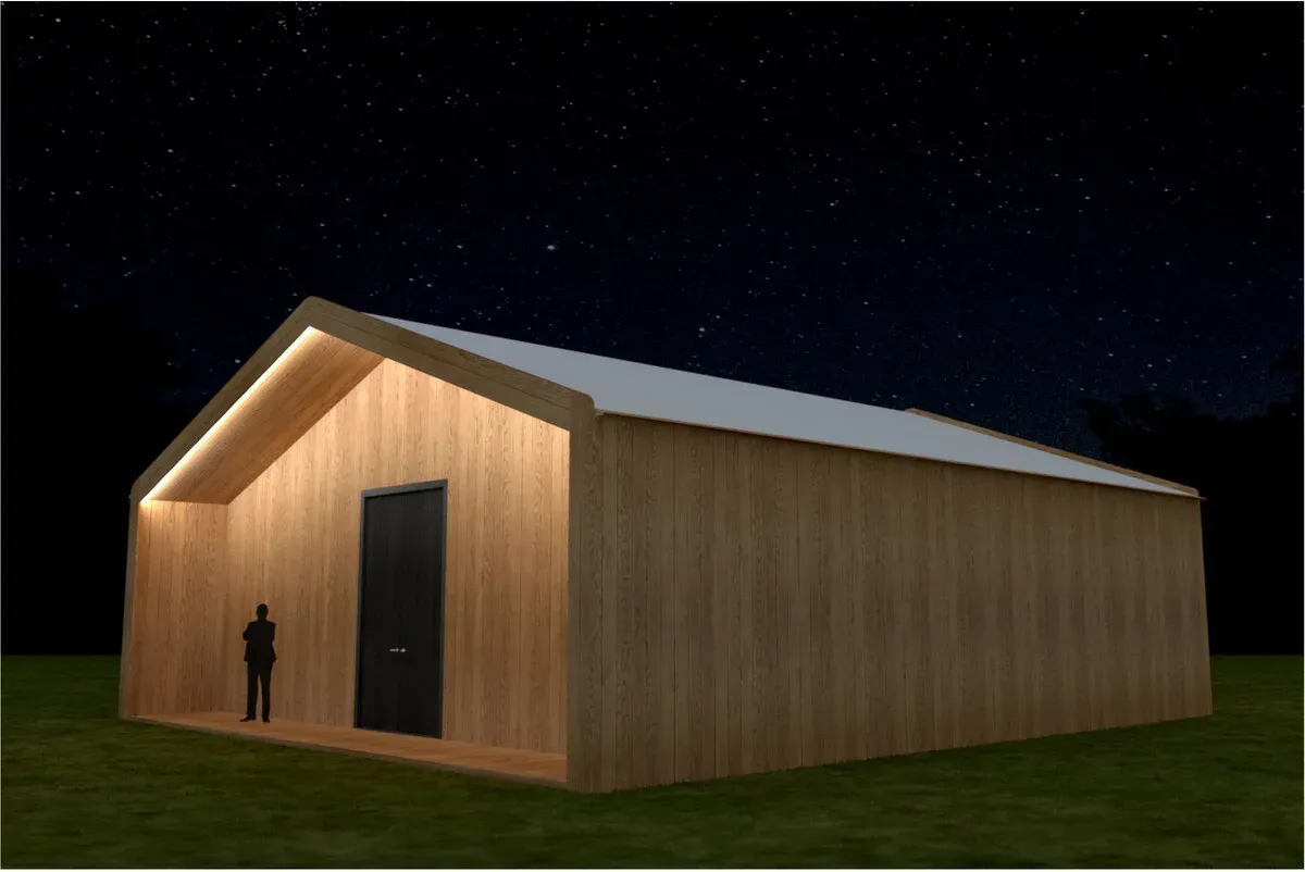 Rendering of the exterior at night: a low timber-clad building with a white roof and a lit, open porch, a figure standing at the entrance